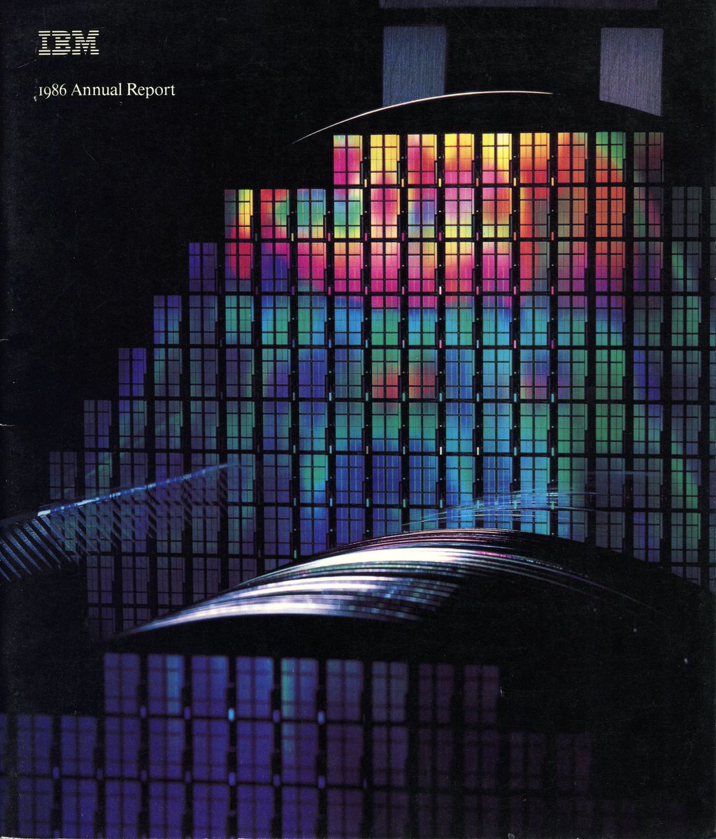 IBM 1986 annual report cover showing a luminous gridded building reflected at night